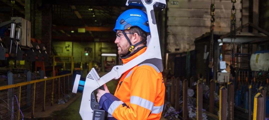 Skanska USA is exploring how AI can intersect with and enhance jobsite automation. Shown here are a Skanska worker using NavViz’s scanner to create digital models.