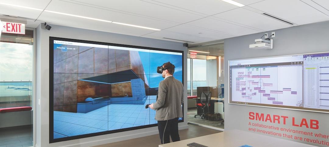 A Suffolk Construction team member explores one of the firm’s projects using a CAVE virtual reality setup