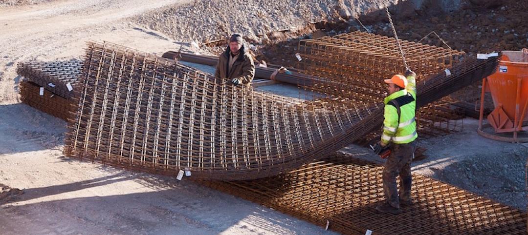 A crane moves materials on a construciton site