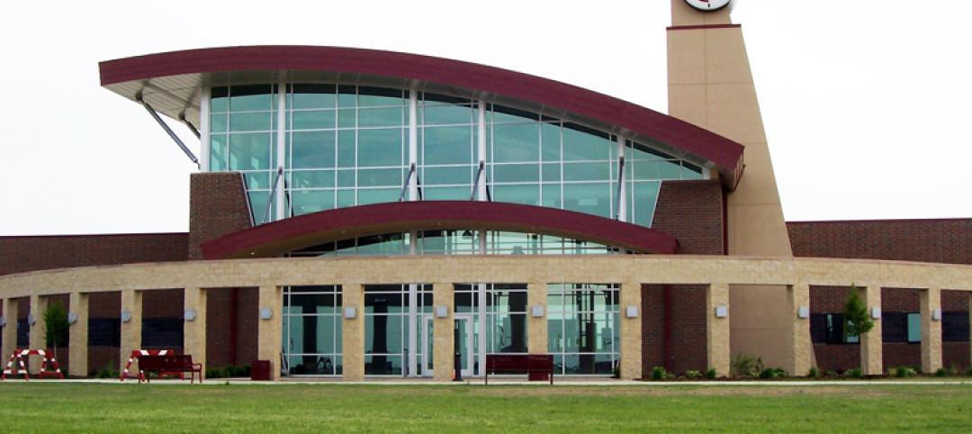 Curved metal panels give roof over community college expansion