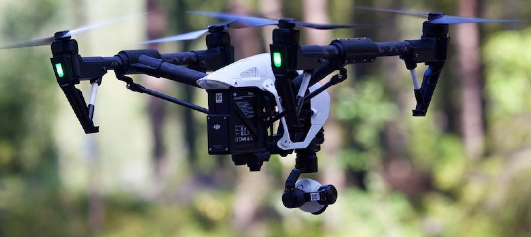 A drone flying in a wooded area