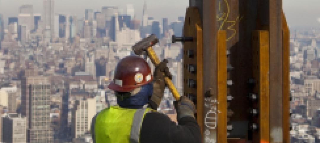 Construction crews set in place a steel horizontal beam at a height (C) CBS News