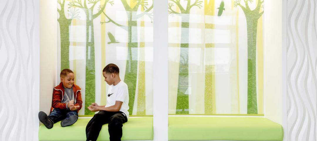 Two boys playing rock paper scissors in pediatric office 