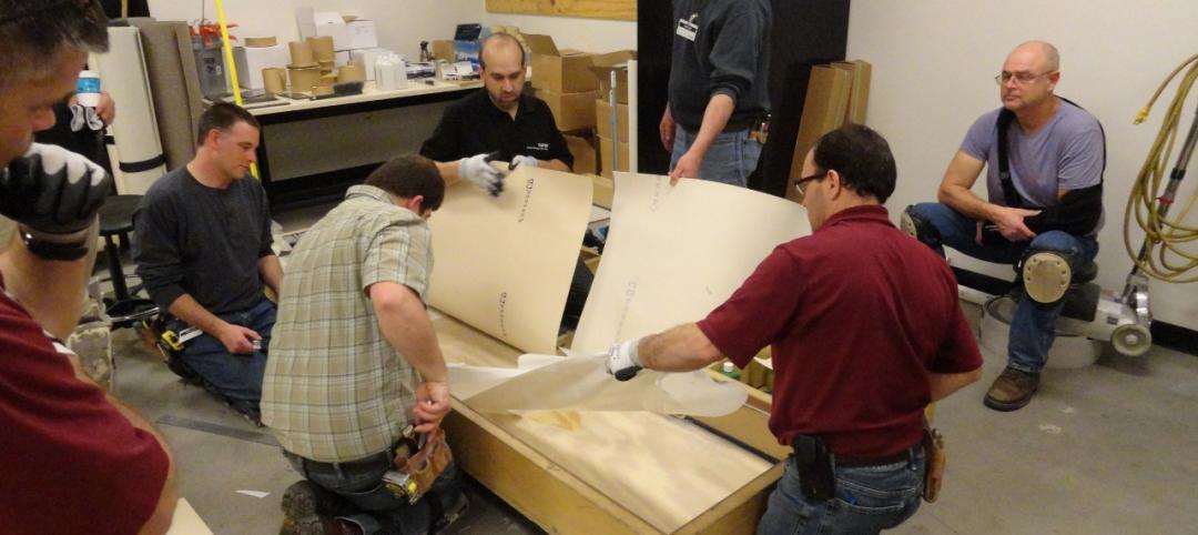 Technical Academy instructor Marc Ilgenfritz, center facing, invites installers 