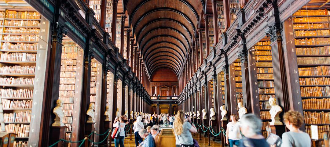 People inside historic library building