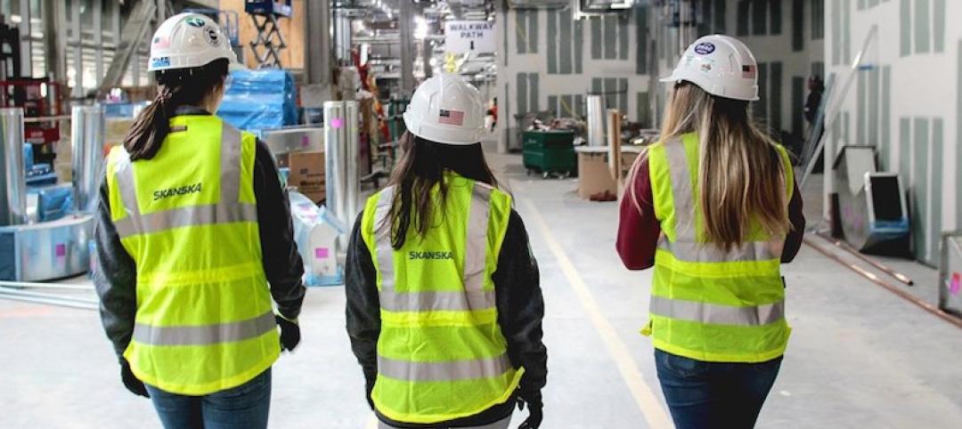 3 women wearing Skanska's new line of PPE