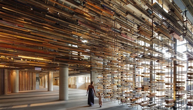 The lobby and staircase use thousands of lengths of repurposed timber. Photo cou